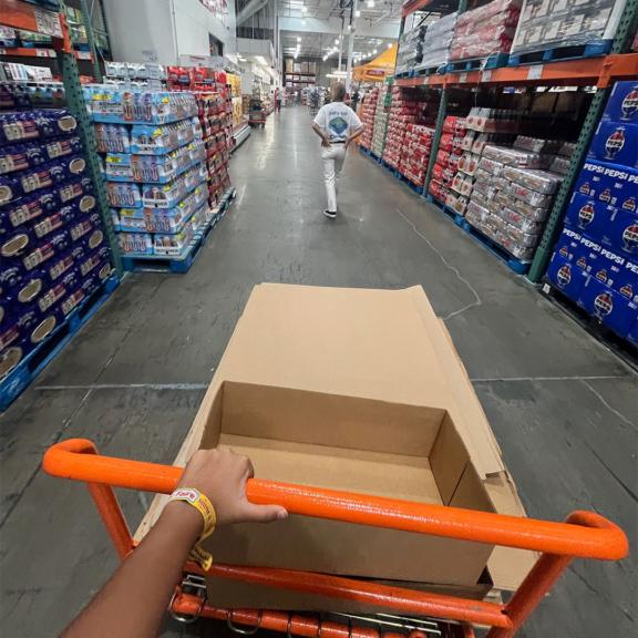 Image depicting team in a big box store collecting cardboard